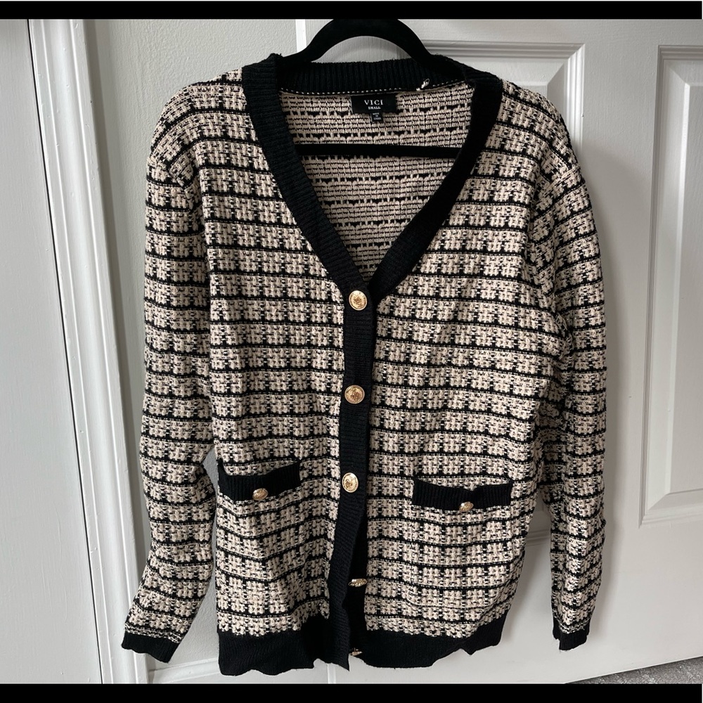 Fabulous cardigan - designer inspired. Black and cream sweater with gold buttons